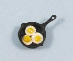 Eggs in a Cast Iron Skillet Half-inch scale